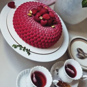 Raspberry and pistachio ganache cakes